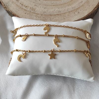 set of 3 golden stainless steel bracelets with tassels