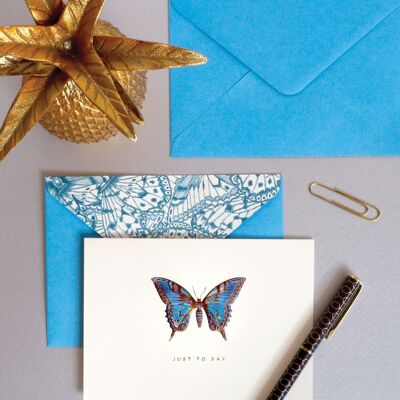 Tarjeta de notas en caja de mariposa azul
