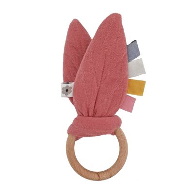 Knisterndes Babyspielzeug hinterlässt staubige Rose aus Öko-Material