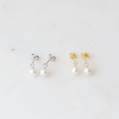 Borchie scintillanti di perle
