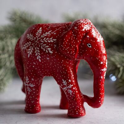 Adorno de papel maché con elefante gigante y copo de nieve rojo