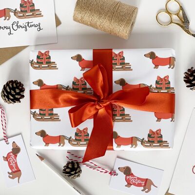 Confezioni regalo e etichette natalizie per bassotto e slitta