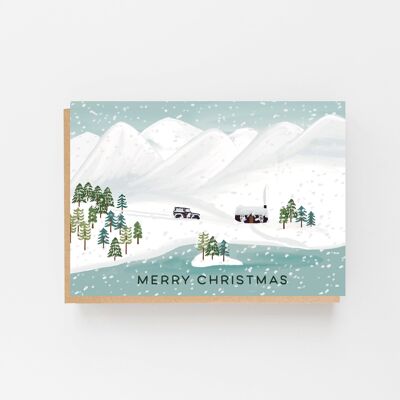Carte de Noël des montagnes enneigées