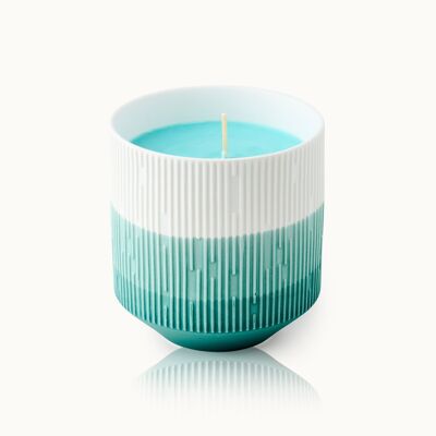 Candle in a glass - teal with colored wax