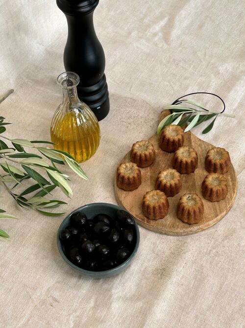 Canelés black olive puree