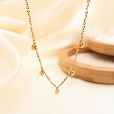 Golden necklace with small round pendants