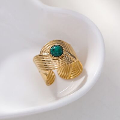 Adjustable golden braid ring with green stone