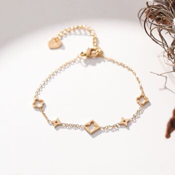 Bracelet chaîne dorée multi trèfle 1