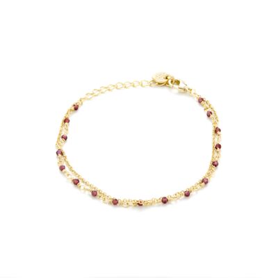 Askha bracelet finished in 18 kt yellow gold.