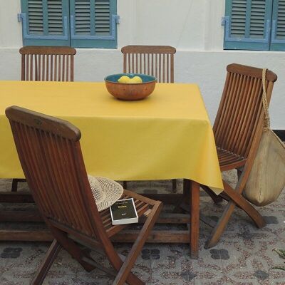 Plain yellow coated tablecloth