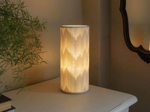 Porcelain column shaped lamp in a tassels design