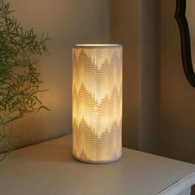 Porcelain column shaped lamp in a tassels design