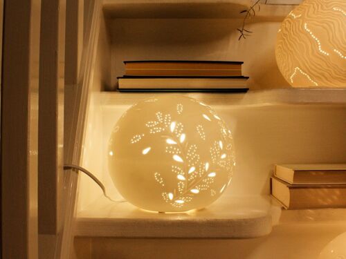 Porcelain lamp in a sphere shape with a golden petals design