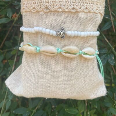 Pastel green ankle chain in Cowry shells and sea turtle