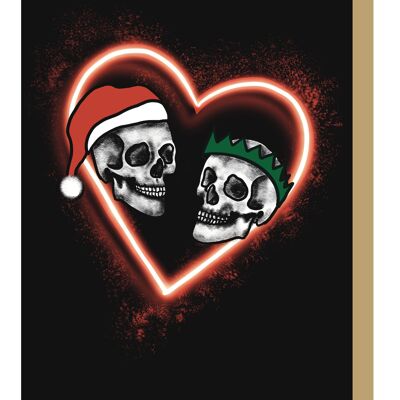 Cartolina di Natale gotica al neon con coppia di teschi