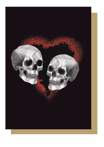 Carte gothique de coeur rouge de couple de crâne