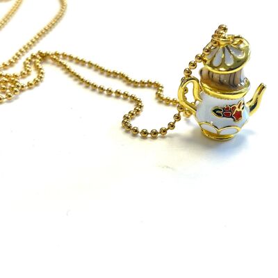 Goldene Teekanne aus Edelstahl mit Halskette und Maus