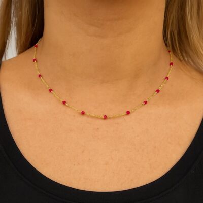 Collar rosario en acero dorado y rubí auténtico.