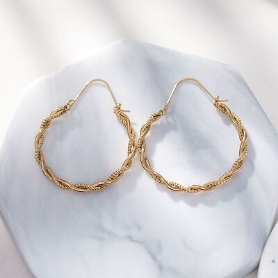 Gold wavy hoop earrings