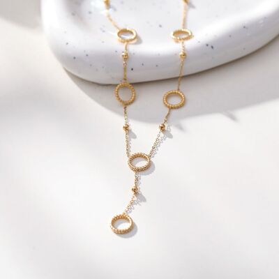 Collar dorado con multi círculo en Y