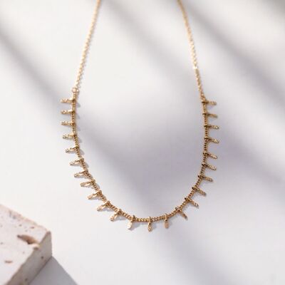 Golden chain necklace with tassels