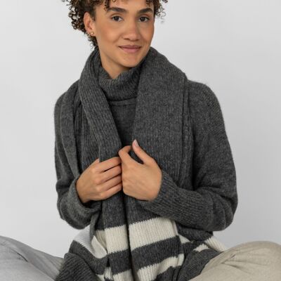 Knitted scarf made primarily from baby alpaca