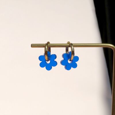 Cerchi in acciaio inossidabile con fiore blu reale