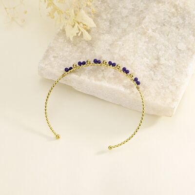 Fine adjustable bangle with blue stones