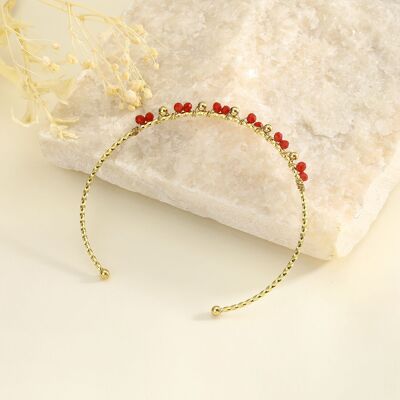 Fine adjustable bangle with red stones