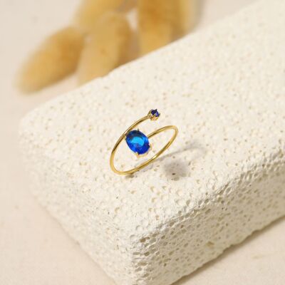 Anillo dorado con abertura y pedrería azul royal