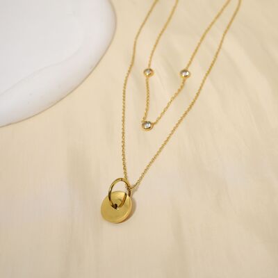 Double chain gold necklace with rhinestones and wheel