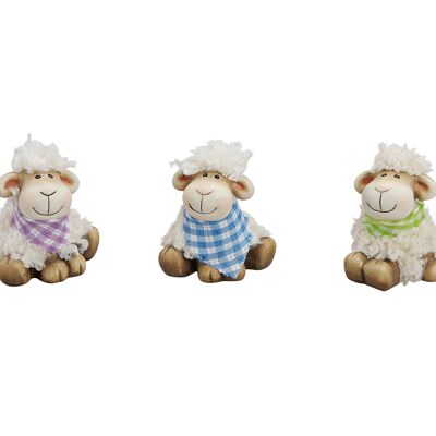 Sheep sitting made of clay / plastic with cloth