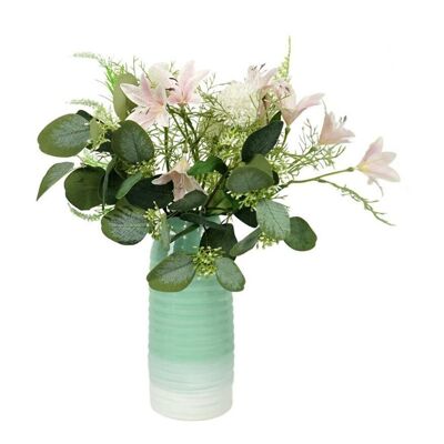 Jarrones de cerámica verde menta/blanco con flores artificiales.