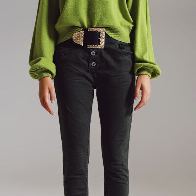 Skinny jeans with visible buttons in military green