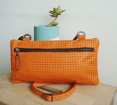 Orange leather bag. Oscar.