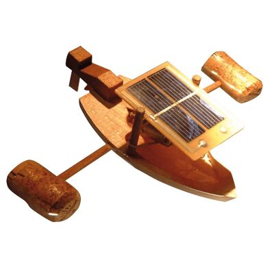Small wooden boat with solar propeller