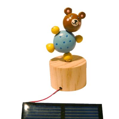 Osito de peluche de madera animado por energía solar.