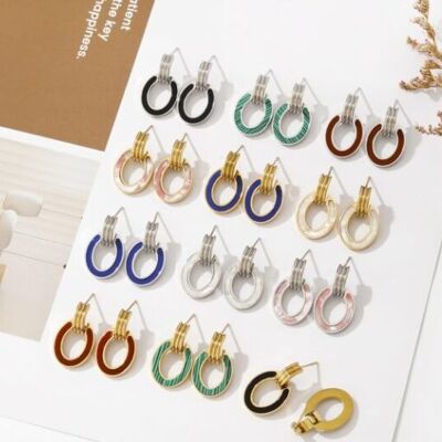 Pearly oval steel earrings