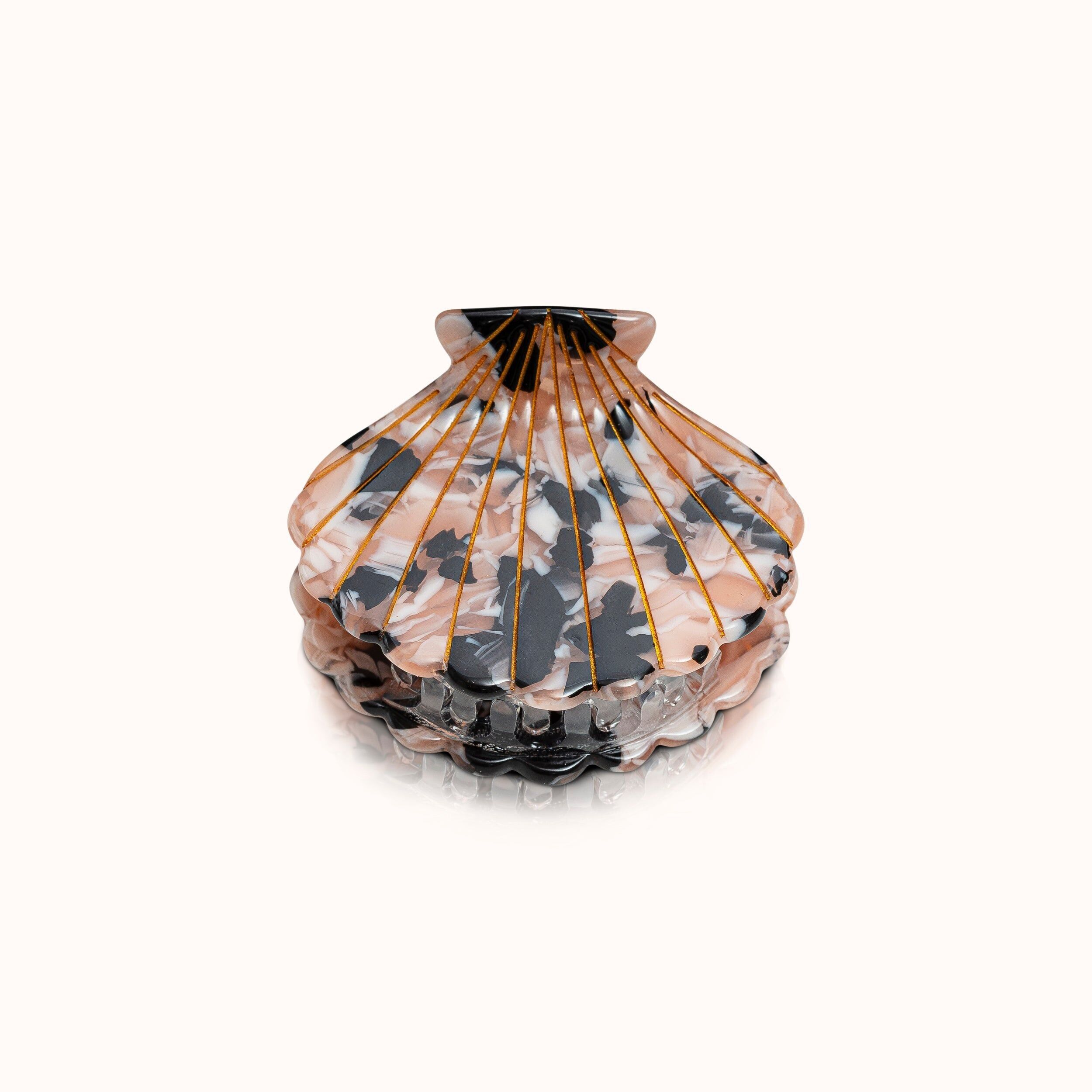 Marmo di conchiglia per capelli