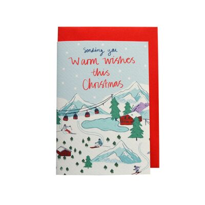 Tarjeta de Navidad con escena de esquí Warm Wishes