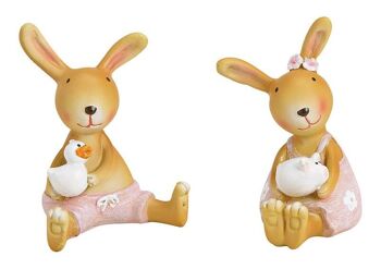Lapin assis en poly rose / rose double