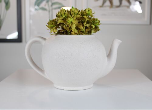Modern white ceramic vase in Teapot form