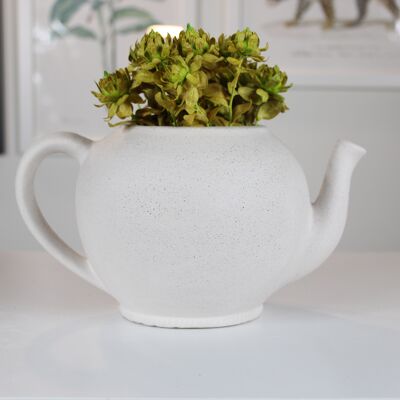 Moderne weiße Keramikvase in Teekannenform