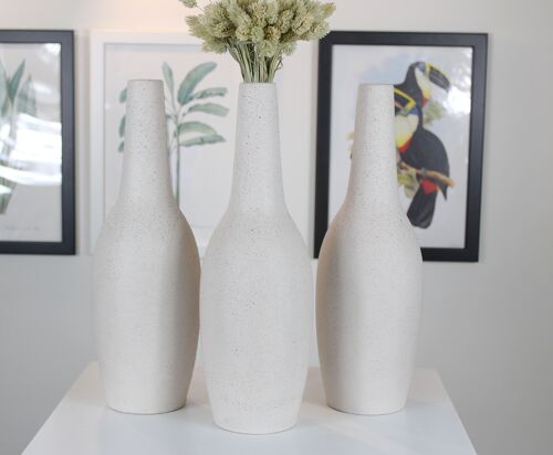 Tall bottle shaped ceramic vase