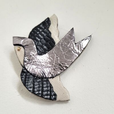 Silver swallow brooch in recycled leather and gold plated