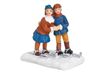 Paire miniature sur skis en poly coloré (L/H/P) 6x6x4cm