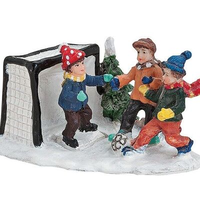Scena di calcio invernale per bambini in miniatura