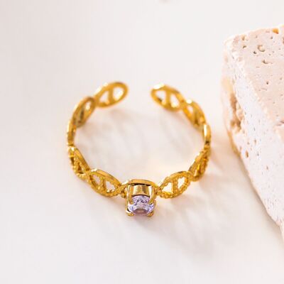 Gold ring with rhinestones