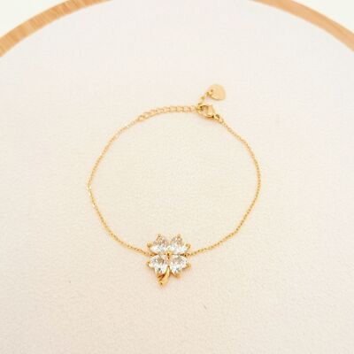 Gold chain bracelet with rhinestone flower