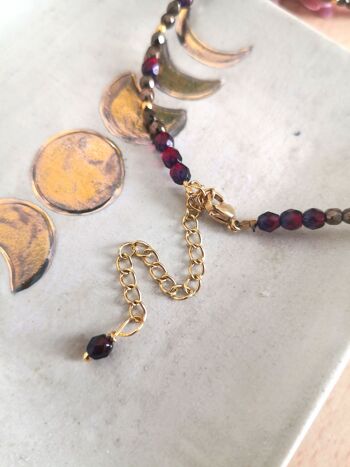 Parure Artémis composée d'un bracelet, un collier et une paire de boucles d'oreilles, cristal et acier doré 7